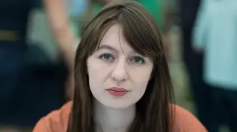 Sally Rooney states she is unable to visit the UK due to potential arrest