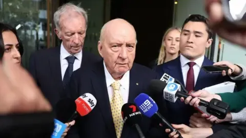 Indecent Assault Accusations Involving Prominent Aussie Broadcaster Downgraded